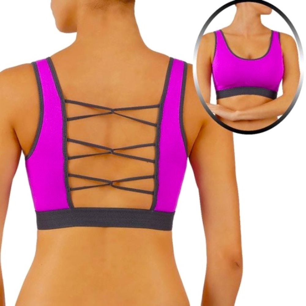 High impact sports bra size medium. Pink with wide straps,  criss cross back